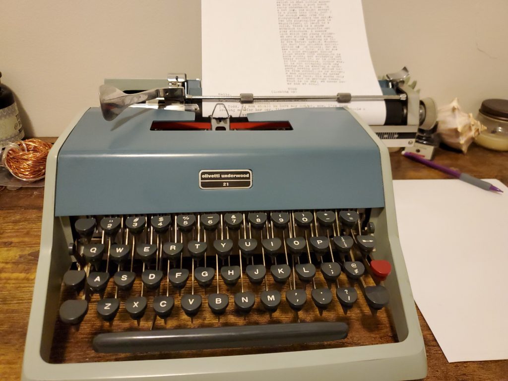 Typewriter with paper in it.